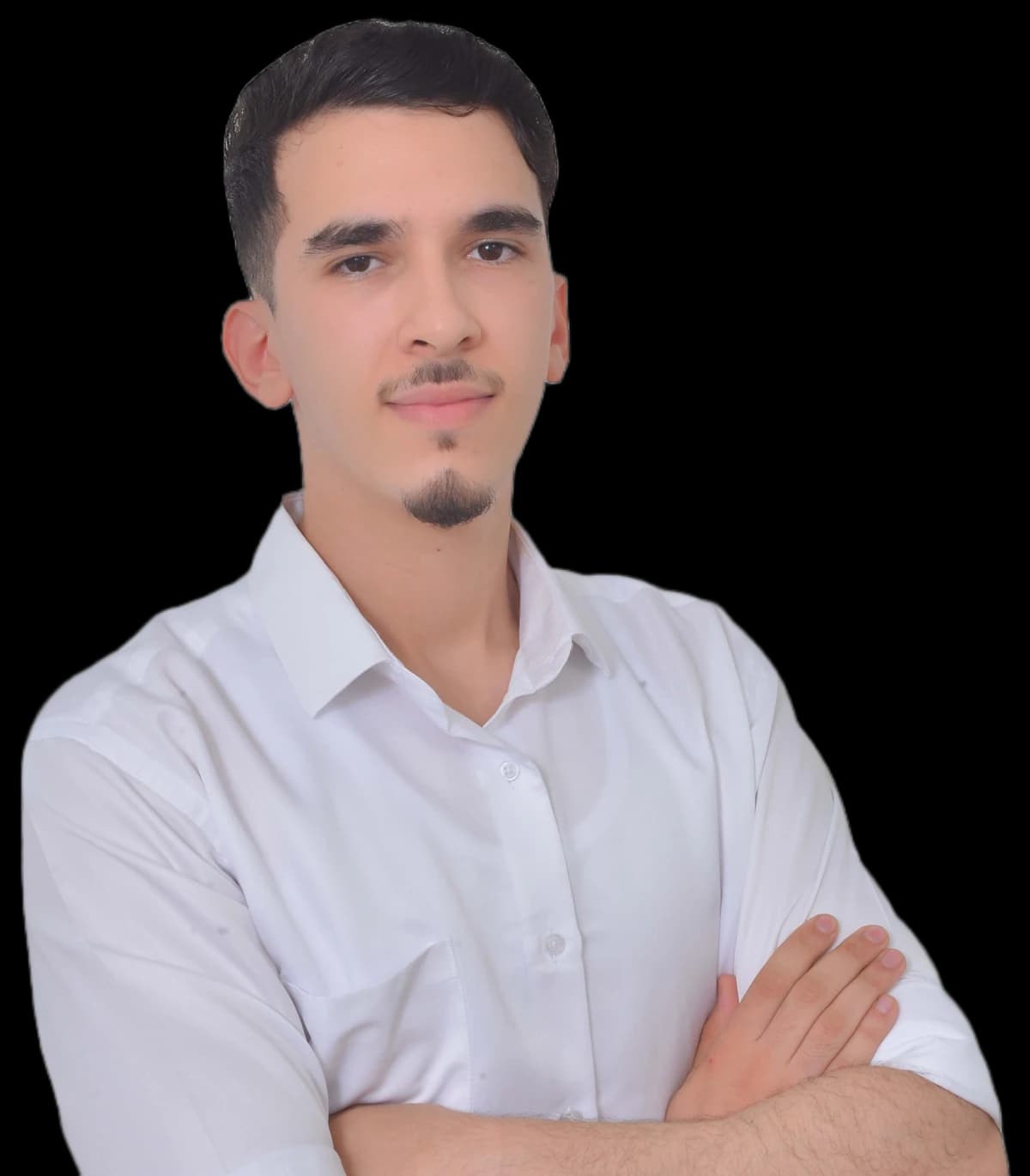 Youssef Aserrar, smiling, arms crossed, in a white shirt.