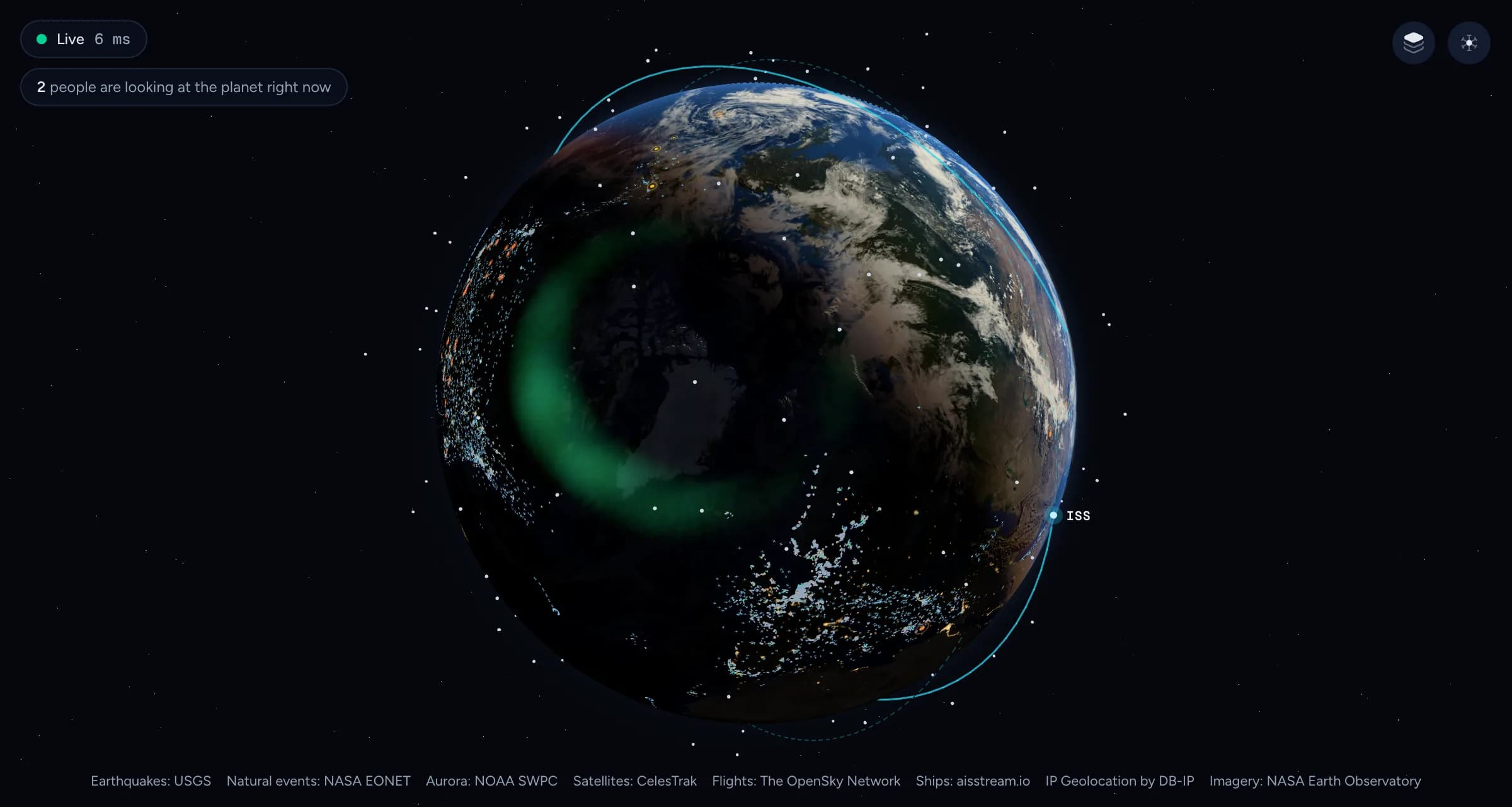 The globe seen from above the North Pole, with the green aurora oval from the NOAA forecast around the Arctic.